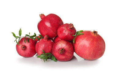 Ripe pomegranates on white background