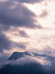 Mountain peak dominated by clouds