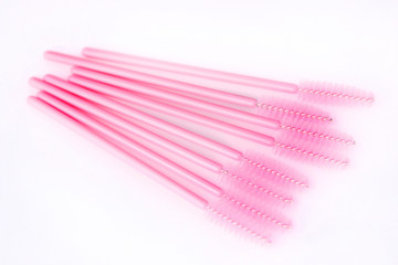 Brushes and tools for building and caring for eyelashes. On a white background. Materials for eyelash extension. Brushes, accessories for eyelash extensions.