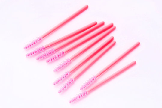 Brushes and tools for building and caring for eyelashes. On a white background. Materials for eyelash extension. Brushes, accessories for eyelash extensions.