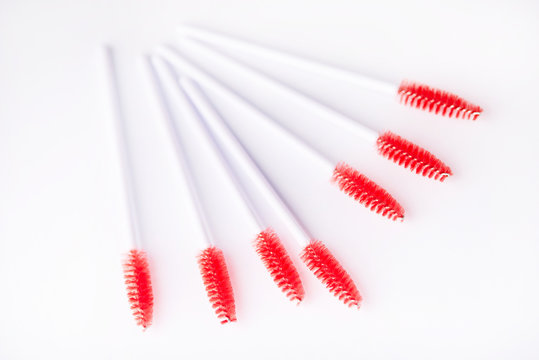 Brushes and tools for building and caring for eyelashes. On a white background. Materials for eyelash extension. Brushes, accessories for eyelash extensions.