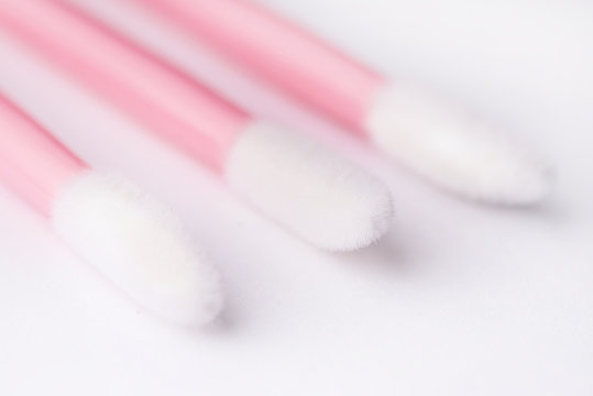 Brushes and tools for building and caring for eyelashes. On a white background. Materials for eyelash extension. Brushes, accessories for eyelash extensions.