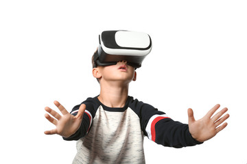 Cute boy with virtual reality glasses on white background