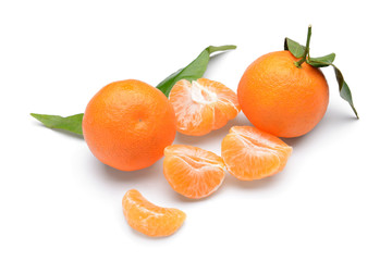 Tasty juicy tangerines on white background