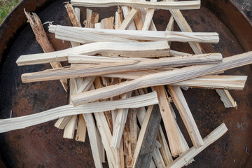 Pile of small wooden stick prepared for camp fire