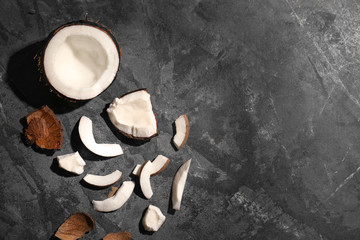 Ripe cut coconut on grey background