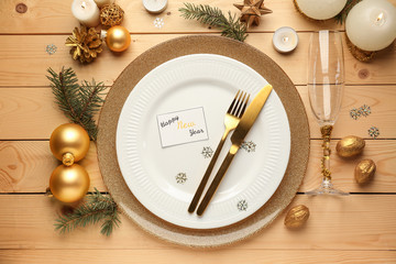 Beautiful Christmas table setting on wooden background