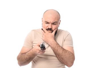 Man with hair loss problem on white background