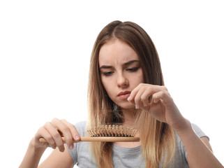 Woman with hair loss problem on white background