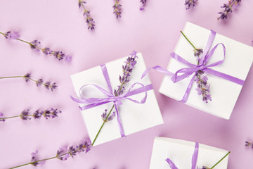 White Gift box with violet ribbon and lavender