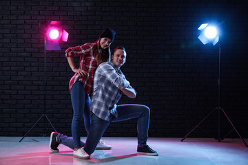 Young couple dancing in club