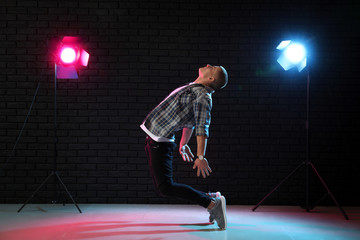 Young man dancing in club