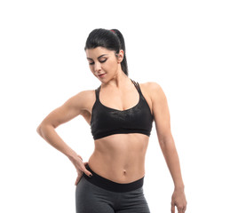 Fototapeta na wymiar Sporty muscular woman on white background