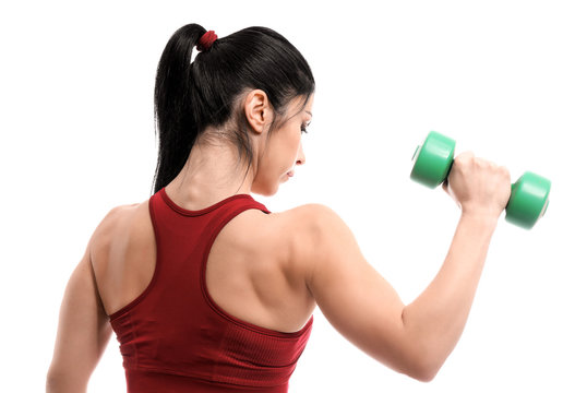 Sporty Muscular Woman With Dumbbell On White Background