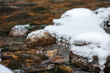 forest river in winter. Amata in Latvia