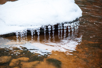 forest river in winter. Amata in Latvia
