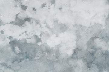 Colorful winter blue ink and watercolor textures on white paper background. Paint leaks and ombre effects. Hand painted abstract image.