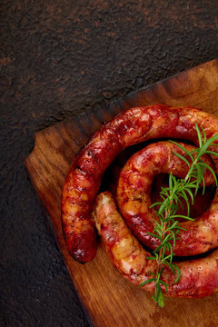 Grilled or Roasted spiral pork sausages with rosemary,