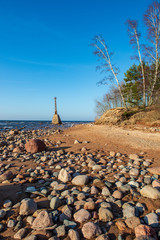 Fototapeta na wymiar lighthouse by the sea