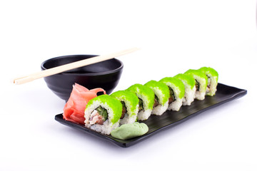 Sushi roll on black plate - traditional japanese food style