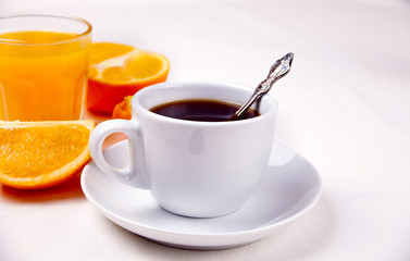 Cup of coffee and fruits and berries on the white background