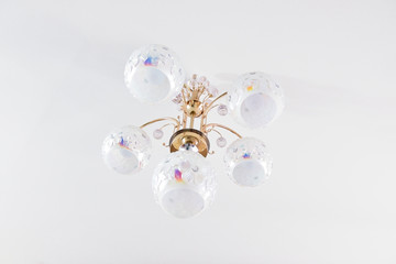 White chandelier on ceiling