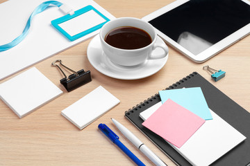 Corporate identity design template on wooden desk close up