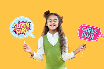 Cheerful happy girl being in a positive mood