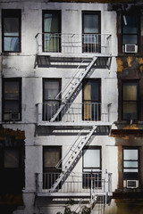 Fototapeta na wymiar White building fire escape stairs