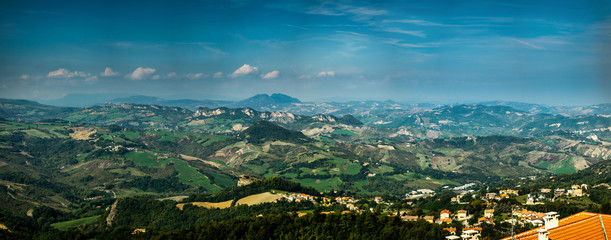 panoramic view on the hilly plain of the foothills of the Apennines from the mountain  Monte Titano, old city of republic of san marino