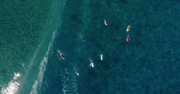 surfing in aerial view, teahupoo papeete french polynesia