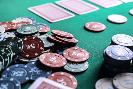 Chips and cards on table in casino