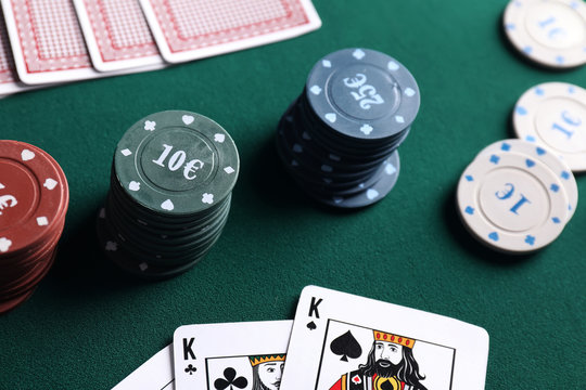 Chips and cards on table in casino