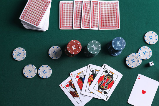 Chips and cards on table in casino
