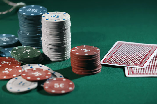 Cards and chips on table in casino