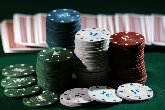 Chips and cards on table in casino