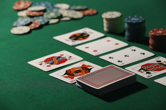 Chips and cards on table in casino
