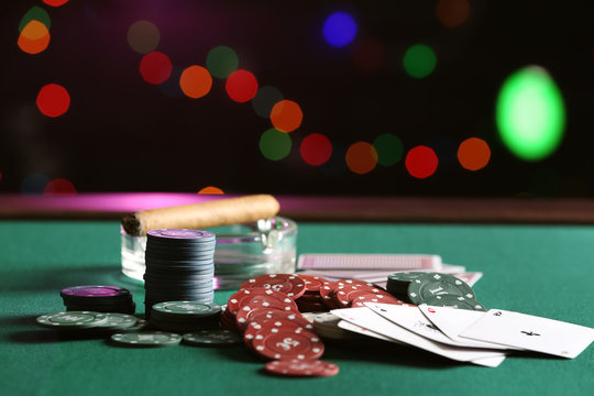 Chips and cards on table in casino