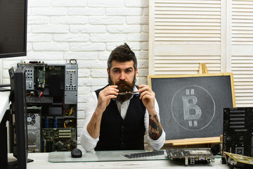 Cryptographer. Bearded man bitcoiner. Bitcoin miner man in server room. Bearded businessman with computer circuits for bitcoin mining. Crypto currency mining hardware. Virtual or digital currency