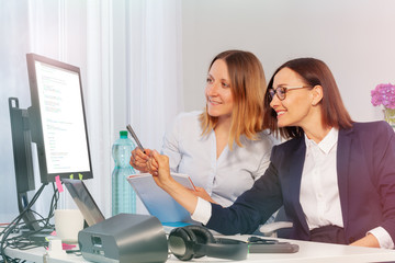 Two business women during meeting in the office