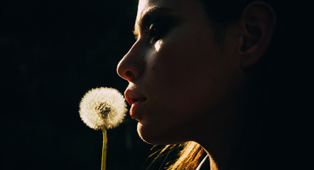 Spring depression. dandelion. face and skincare. Travel in summer. Summer girl with long hair. Natural beauty and spa therapy. Woman with fashion makeup. Spring woman. Springtime and vacation