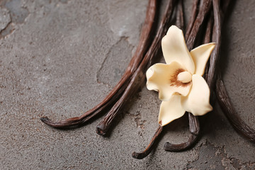 Aromatic vanilla sticks on grey background