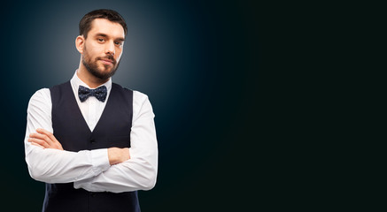 people concept - man in party clothes and bowtie over black background