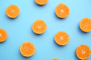 Many pieces of orange on color background
