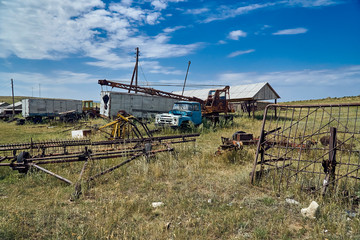 The old Soviet auto and agricultural machinery abandoned in the steppe not far from Sartymbet...