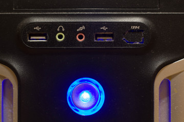 The front of the computer with the power button