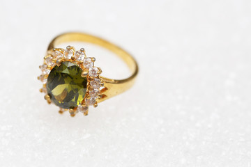 Beautiful gold ring with green gemstone