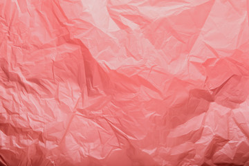 Texture of coral crumpled paper
