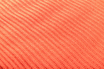 Coral knitted clothes, closeup