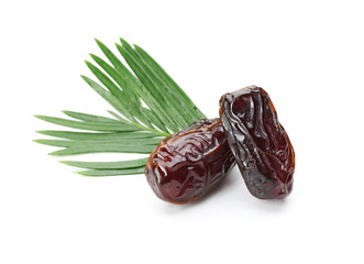 Sweet dried dates on white background